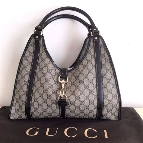 who designs gucci bags|authentic Gucci shoulder bag.